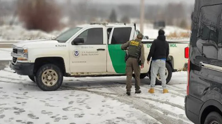 U.S. Customs and Border Protection agents in the Houlton Sector arrest a person who illegally crossed the U.S.-Canada border into Maine this month. (U.S. Customs and Border Protection-Houlton Sector)