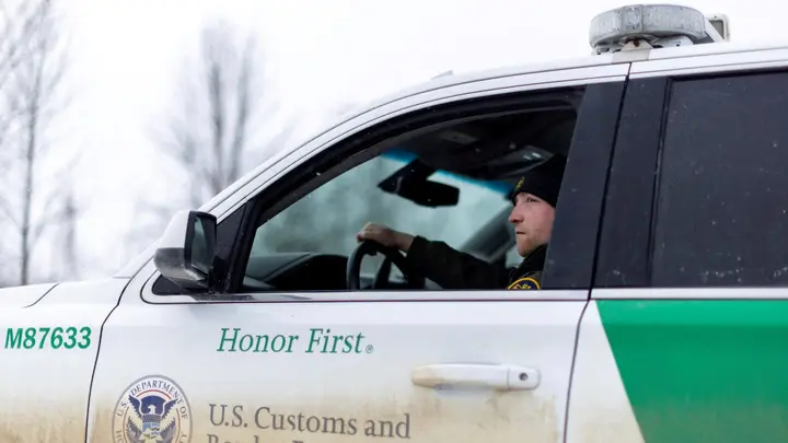 A Border Patrol agent keeps an eye on a road near the U.S.-Canada border in Mooers Fork, N.Y., on Jan. 23, 2025. (REUTERS/Carlos Osorio)